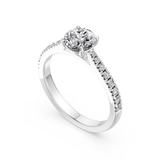 Bague de fiançailles Solitaire Cadet, diamant rond sur monture cathédrale quatre griffes, or blanc 18 carats ou platine 950 — Maison Laveran Paris