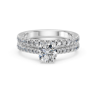 Bague de fiançailles Solitaire Cadet, diamant rond sur monture cathédrale quatre griffes, or blanc 18 carats ou platine 950 — Maison Laveran Paris