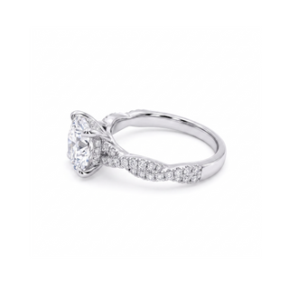 Bague Cardinet, solitaire diamant rond sur jonc torsadé pavé, or blanc 18 carats ou platine 950 — Maison Laveran Paris