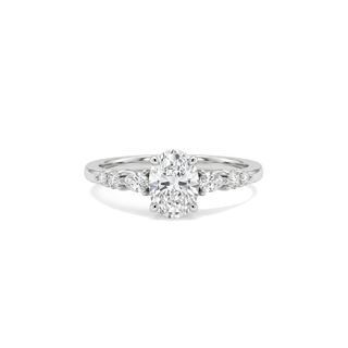 Bague Dauphine, diamant ovale épaulé de diamants poires et ronds, or blanc 18 carats ou platine 950 — Maison Laveran Paris