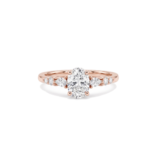 Bague Dauphine, diamant ovale épaulé de diamants poires et ronds, or rose 18 carats — Maison Laveran Paris