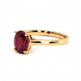 Montaigne Ring, oval synthetic ruby (lab-created stone), three-quarter view, 18k yellow gold — Maison Laveran Paris