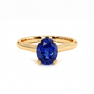 Montaigne-Ring, synthetischer blauer Saphir im Ovalschliff (synthetischer Stein), 18 Karat Gelbgold — Maison Laveran Paris