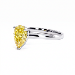 Montaigne Pear Ring, yellow lab-grown diamond, three-quarter view, 18k white gold or 950 platinum — Maison Laveran Paris