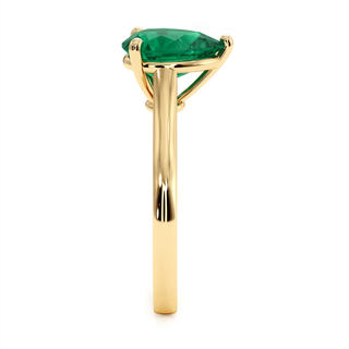 Montaigne Ring, pear-cut synthetic emerald (lab-created stone), profile view, 18k yellow gold — Maison Laveran Paris