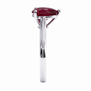 Montaigne Ring, pear-cut synthetic ruby (lab-created stone), profile view, 18k white gold or 950 platinum — Maison Laveran Paris