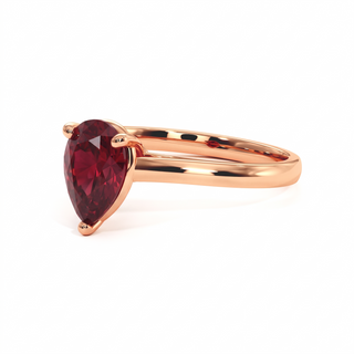 Montaigne Ring, pear-cut synthetic ruby (lab-created stone), three-quarter view, 18k rose gold — Maison Laveran Paris