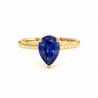 Montaigne Ring, pear-cut synthetic blue sapphire (lab-created stone), 18k yellow gold — Maison Laveran Paris