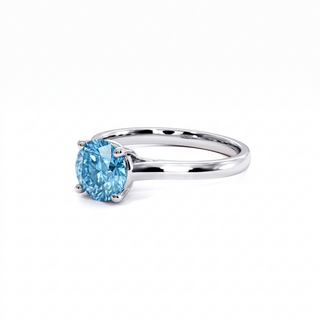 Montaigne Round Ring, blue lab-grown diamond, three-quarter view, 18k white gold or 950 platinum — Maison Laveran Paris