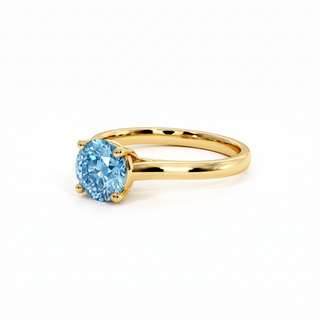 Montaigne Round Ring, blue lab-grown diamond, three-quarter view, 18k yellow gold — Maison Laveran Paris