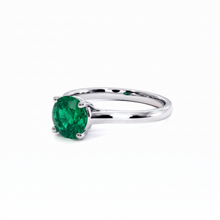 Montaigne Ring, round-cut synthetic emerald (lab-created stone), three-quarter view, 18k white gold or 950 platinum — Maison Laveran Paris