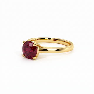 Montaigne Ring, round-cut synthetic ruby (lab-created stone), three-quarter view, 18k yellow gold — Maison Laveran Paris