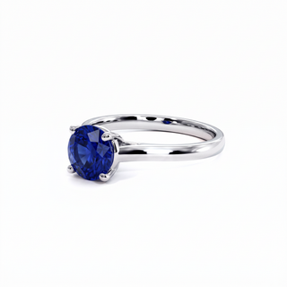 Montaigne Ring, round-cut synthetic blue sapphire (lab-created stone), three-quarter view, 18k white gold or 950 platinum — Maison Laveran Paris