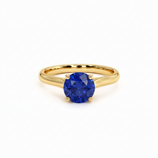 Montaigne Ring, round-cut synthetic blue sapphire (lab-created stone), 18k yellow gold — Maison Laveran Paris