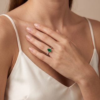 Vendôme Synthetic Emerald Pear Ring worn on the finger, shown in 18k white gold — Maison Laveran Paris